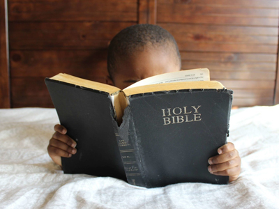 Little Boy Reading the Bible